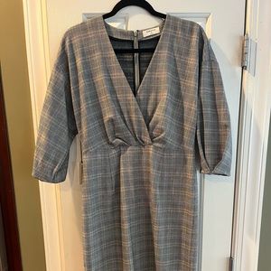 This dress can be worn to the office or out to a party